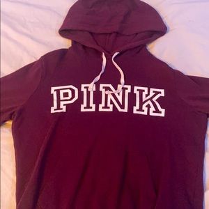 Pink cropped maroon hooded sweatshirt